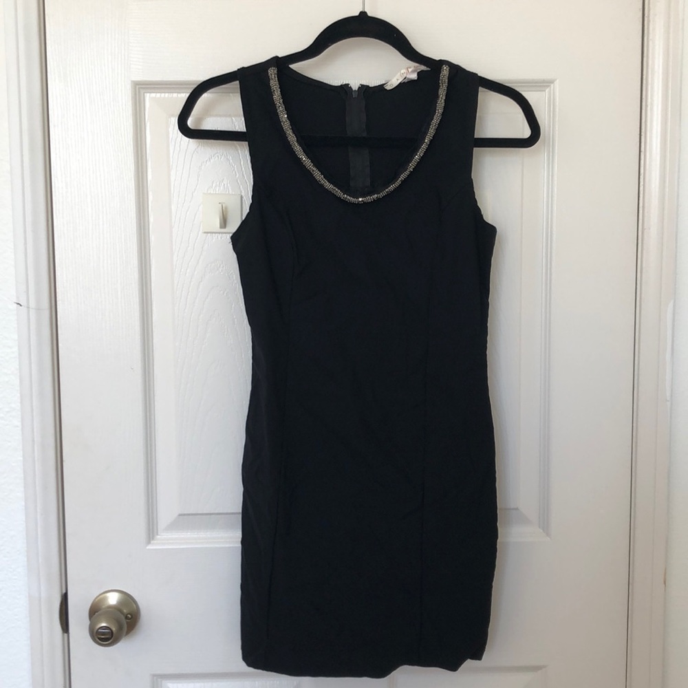 Black fitted dress with beading